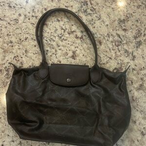 Longchamp leather bag with the horse logo on it, small size